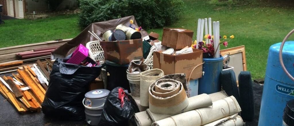 Junk removal services removing unwanted items from residential property